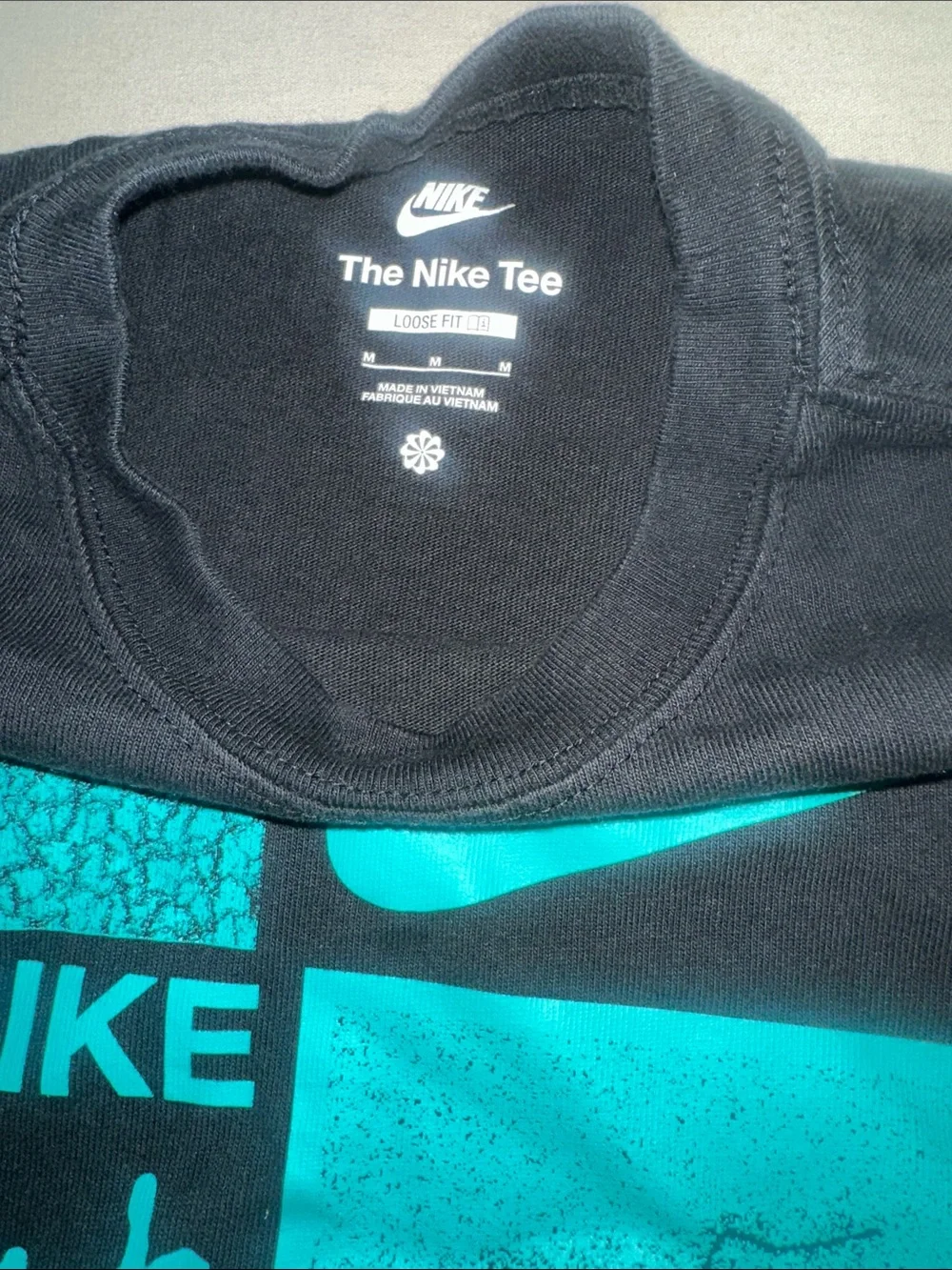 Kids Size M Nike Black Tee with Teal Graphic Panels